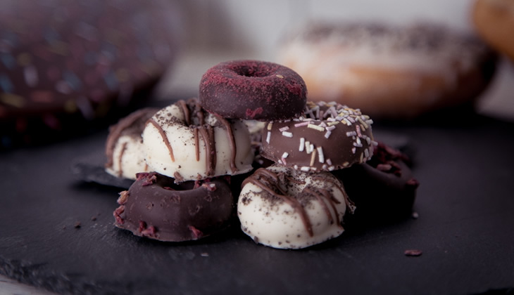 Krispy Kreme white, milk and dark chocolate ring dounghnuts