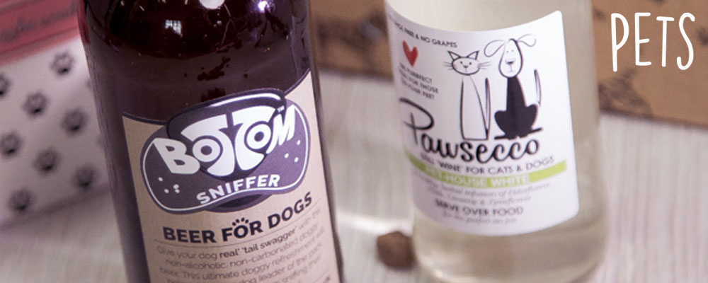 Bottles of 'Bottom Sniffer' beer for dogs and 'Pawsecco' wine for cats and dogs