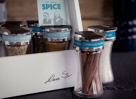 Hairy Bikers brand spice rack with jars of dried spices